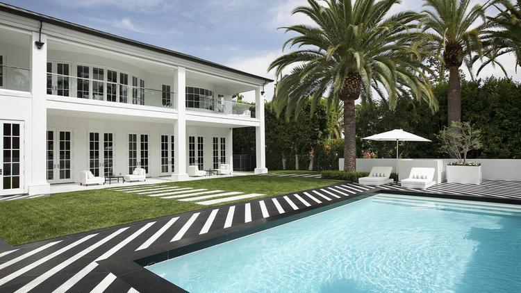  The house is in one of the most exclusive Beverley Hills postcodes surrounded by palm trees