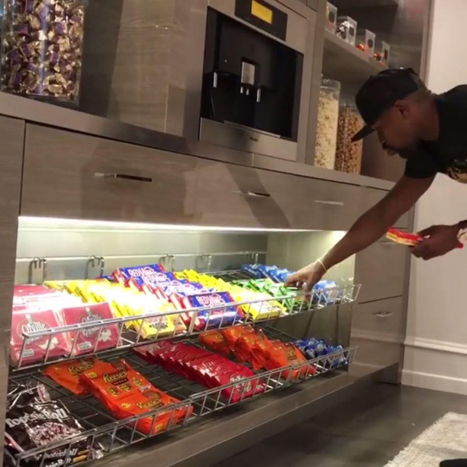  Mayweather dives into his sweet collection at his Beverly Hills pad